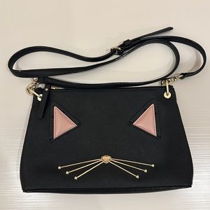 Kate spade cat whiskers purse.